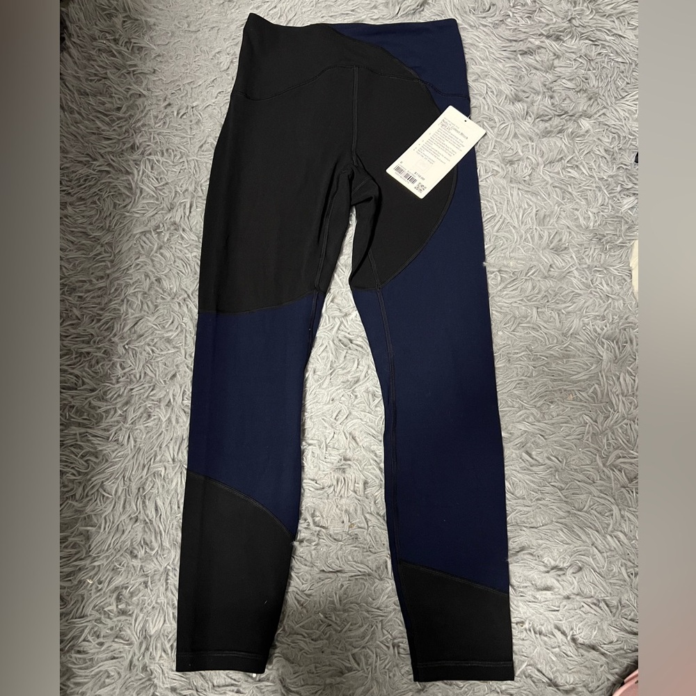 Lululemon Nulu Black and Navy Color block Tights 25”